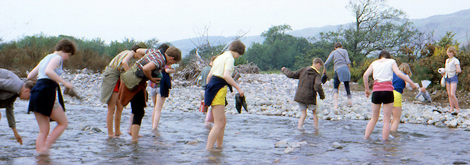Paddling across a river during the 1963 YHA Holiday