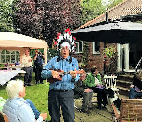 President Bob Lord playing his ukulele