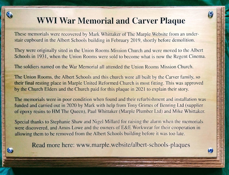 Brass plaque explaining memorials' story