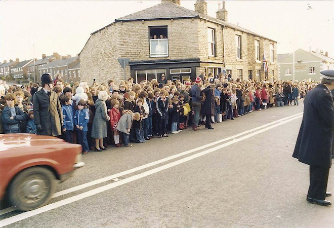 Crowds await Prince Charles on Stockport Road