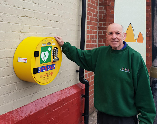 Electrician Mike Beese with the new Defibrillator