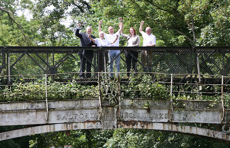 Left to to right, Cllr. Dave Goddard (Leader of Stockport Council), Ann Hearle, Mark Whittaker, Nicola Marshall (HLF Project Officer) and Peter Clarke celebrate news of the Heritage Lottery Grant