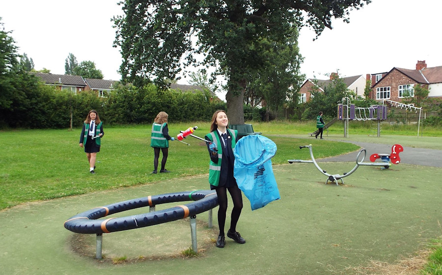 Students picking litter in Cromwell Avenue Park