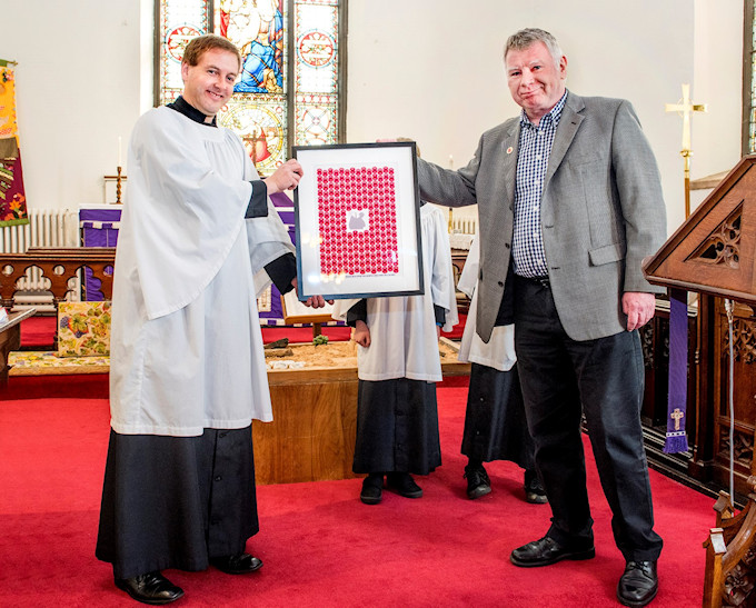 Kevin Murray receives the Poppy Appeal donation