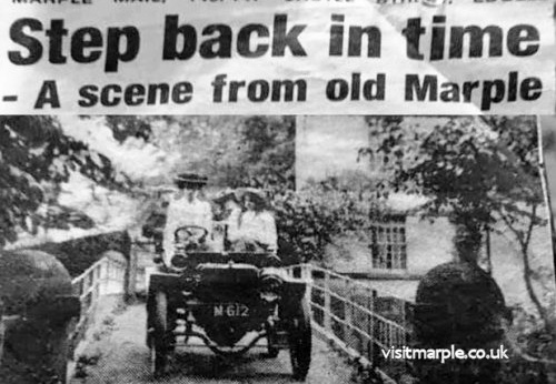 Vintage car crossing the Iron Bridge in 1905